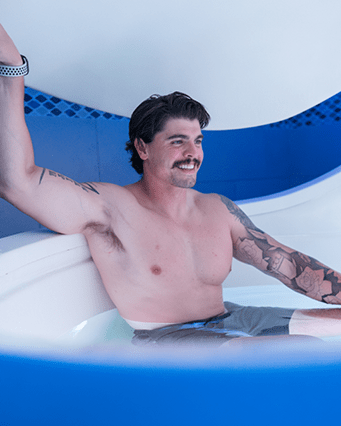 Man relaxing in float pod